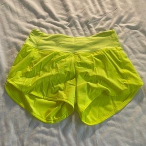 Size 4, 4 inch Lululemon speed up shorts in highlight yellow